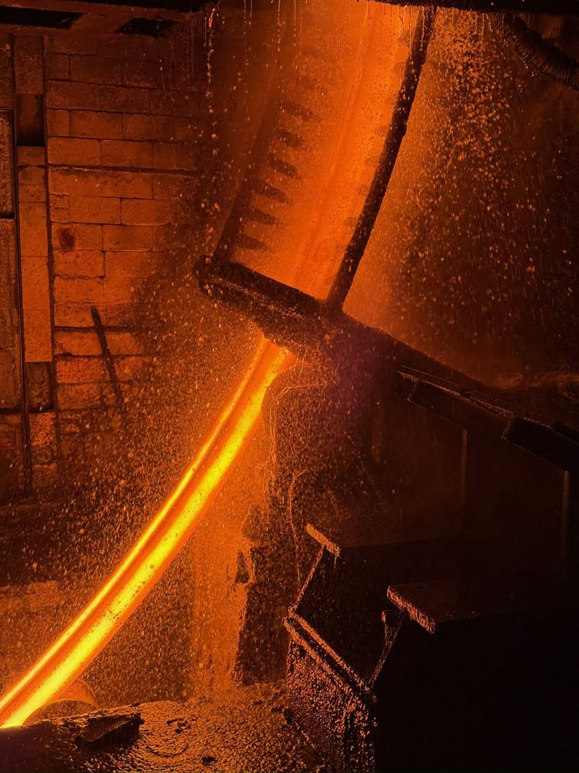 Molten steel pouring from the induction furnace